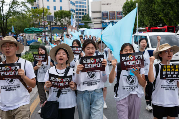 University students march in downtown Seoul to protest against the dumping of contaminated water from Fukushima, on 9 August, 2023 in South Korea.