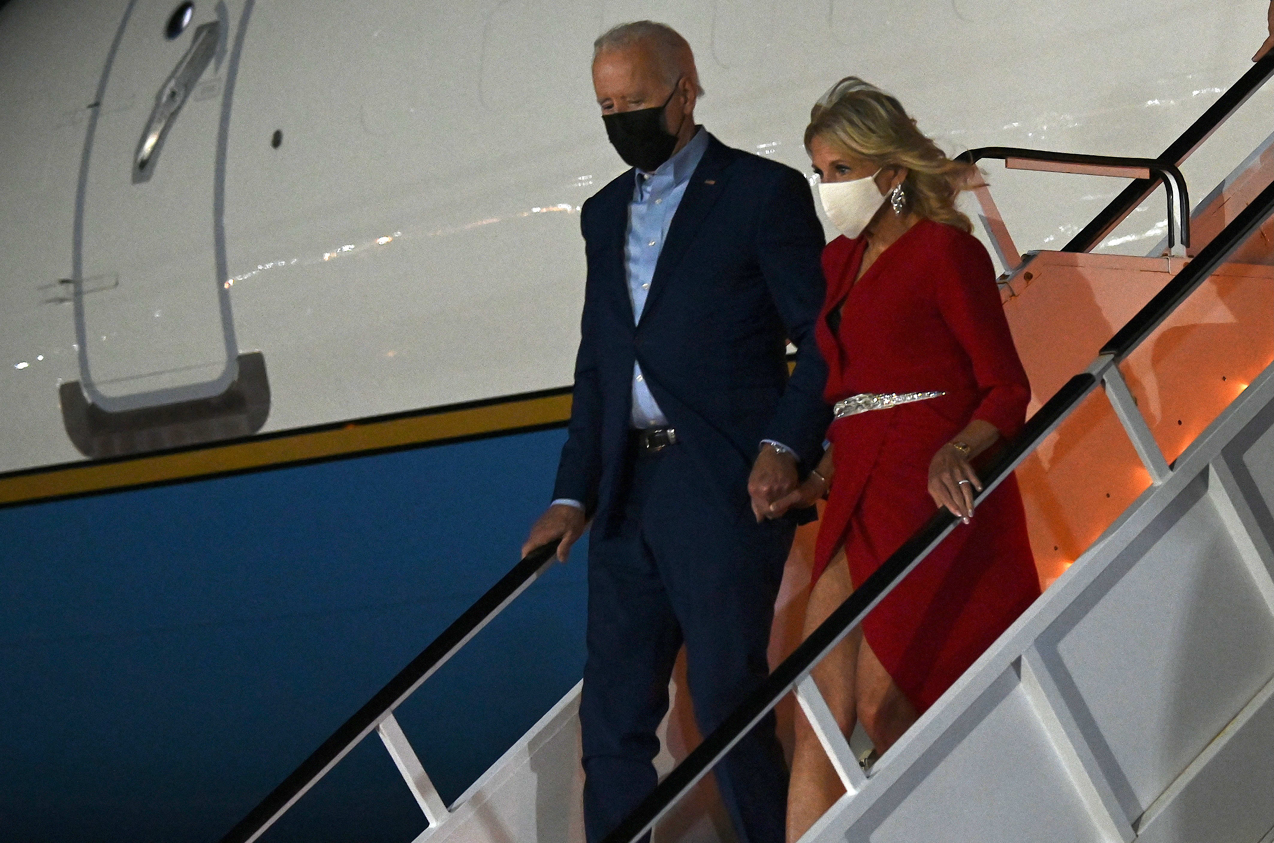 US President Joe Biden and First Lady Jill Biden step off Air Force One upon arrival at LaGuardia airport in New York, ahead of /11 commemorations