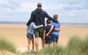 This photograph, taken by Princess Catherine, was taken on the Norfolk coast in May and posted to mark Father's Day in the United Kingdom.