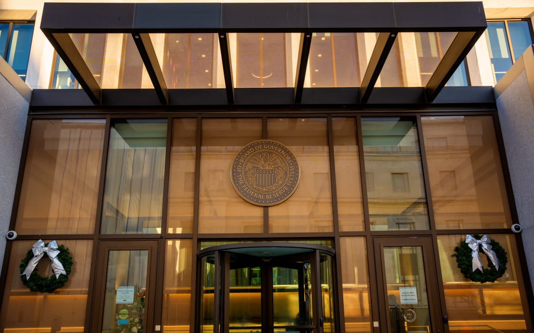 WASHINGTON, DC - DECEMBER 9: The The Federal Reserve logo is visible on the William McChesney Martin Jr. Building on December 9, 2025 in Washington, DC. The Federal Open Market Committee (FOMC), the policy-making arm of the Federal Reserve, starts its two-day meeting today and will release its interest rate decision and policy statement tomorrow.   Andrew Harnik/Getty Images/AFP (Photo by Andrew Harnik / GETTY IMAGES NORTH AMERICA / Getty Images via AFP)