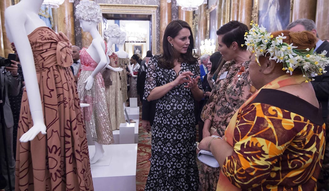 Duchess of Cambridge Kate Middleton (left), New Zealand designer Karen Walker (centre) and Tukua Turia from The Cook Islands chat during a reception to mark the creation of the Commonwealth Fashion Exchange initiative at Buckingham Palace.