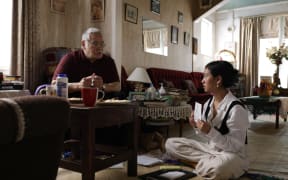 A screenshot from the film Lea Tupu'anga / Mother Tongue, starring Luciane Buchanan and Albert Heimuli.