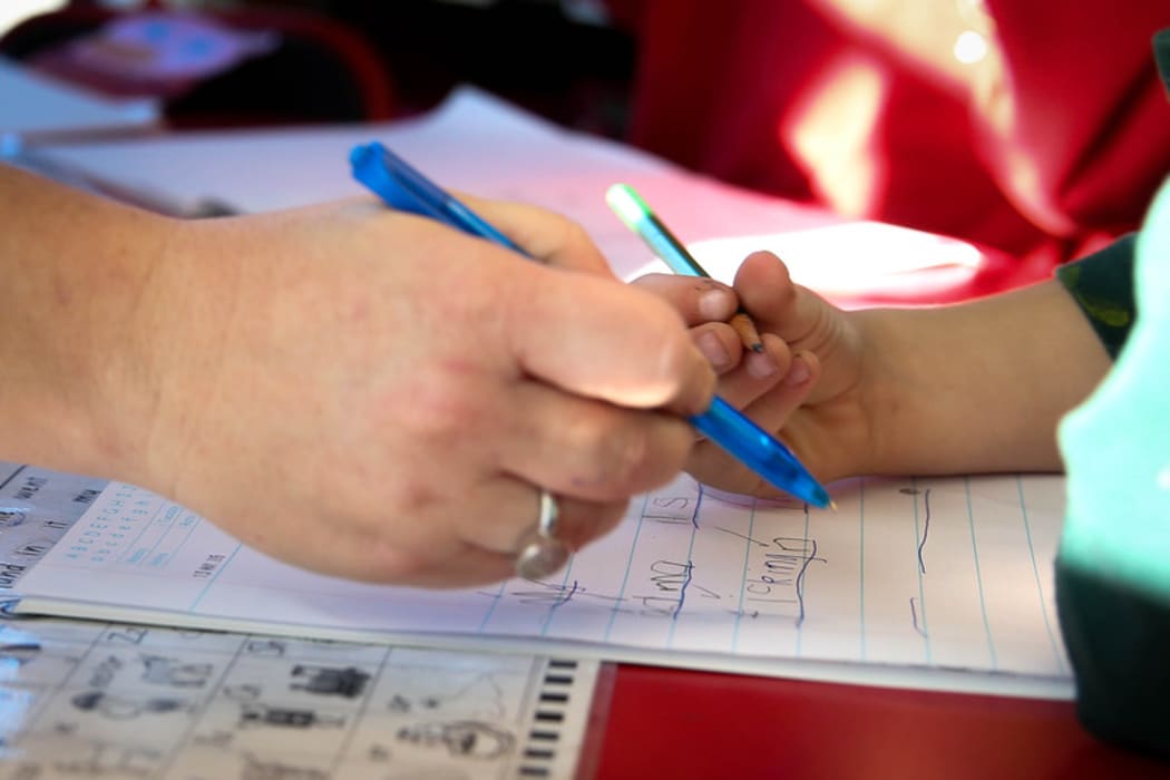 Teacher and student at Linwood Primary School, Christchurch.