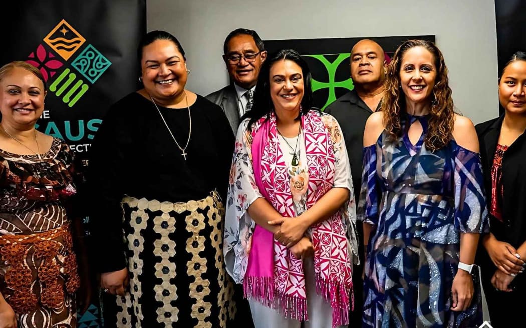 Some members of The Cause Collective team with Children's Minister, Karen Chhour, front third from left, and TCC CEO Rachel Enosa, front second from right. Photo/The Cause Collective