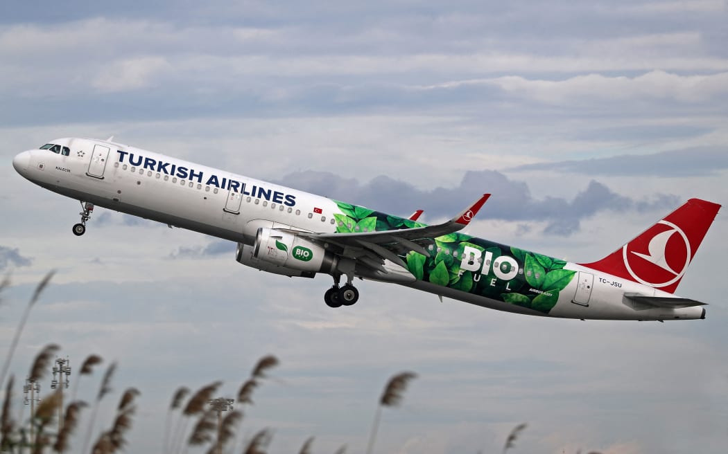 Biofuel creates significantly less greenhouse gasses compared to fossil fuels. A Turkish Airlines Airbus A321-231 with biofuel livery, taking off from Barcelona airport, in Spain, on 15 November 2022.
