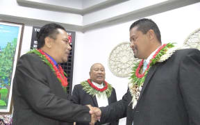 New Speaker Kenneth Kedi (left) congratulates new President Casten Nemra (right)