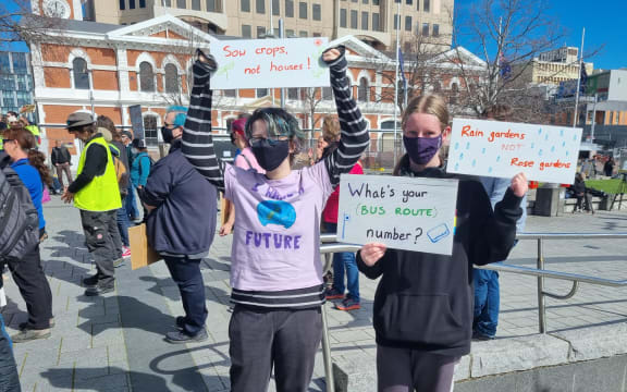 Children hold signs at the School Strike 4 Climate in Cathedral Square, Christchurch.