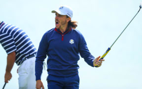 Tommy Fleetwood celebrates during his maiden Ryder Cup.
