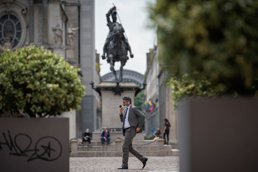 A man walks in Piazza San Carlo square in Turin, Italy. As Italy begins a staged end to Europe's longest coronavirus lockdown.