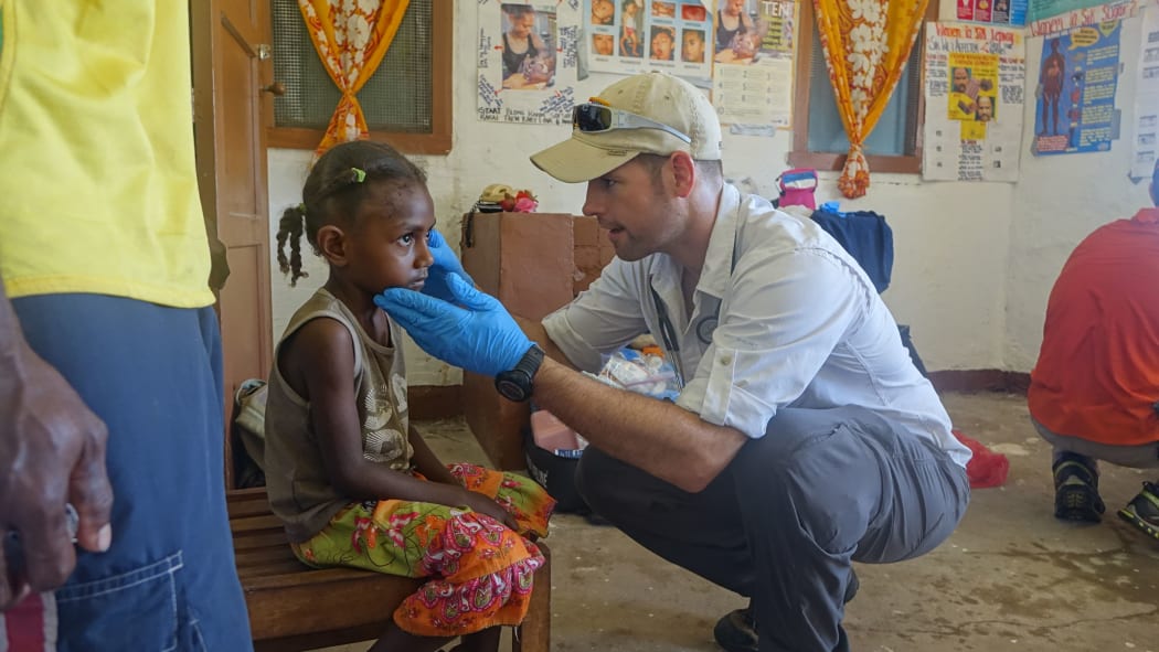 Lucas a US Pararescue Medic running one of the emergency health clinics, this one was at Lamen Island North Epi.