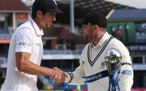 New Zealand cricket captain Brendon McCullum (right) and his England counterpart Alastair Cook share the spoils.