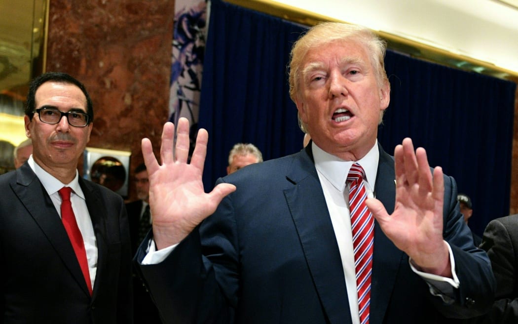 US President Donald Trump, after making comments that "both sides' were responsible for violence in Virginia.