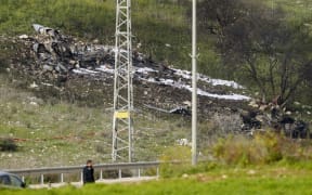 The remains of an Israel F-16 that crashed after coming under fire by Syrian air defences during attacks against "Iranian targets" in the war-torn country.