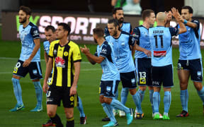 Sydney FC celebrate a goal against the Wellington Phoenix.