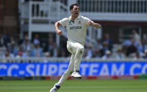 Australia's captain Pat Cummins celebrates taking the wicket of South Africa's David Bedingham on day two of the ICC World Test Championship cricket final match at Lord's in London, 12 June, 2025.