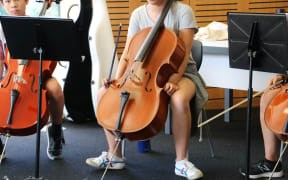 75 teenagers are practising for a week long summer programme run by the Auckland Philharmonic Orchestra