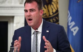 WASHINGTON, DC - JUNE 18: Governor Kevin Stitt (R-OK) speaks during a roundtable at the State Dining Room of the White House June 18, 2020 in Washington, DC. President Trump held a roundtable discussion with Governors and small business owners on the reopening of Americans small business.   Alex Wong/Getty Images/AFP (Photo by ALEX WONG / GETTY IMAGES NORTH AMERICA / Getty Images via AFP)