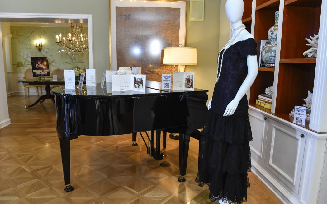 Princess Diana's 1987 Victor Edelstein magenta silk and lace evening dress is displayed during Julien's Auctions' press preview of "Princess Diana's Elegance & a Royal Collection", ahead of an exclusive private showing at the Peninsula Beverly Hills, Beverly Hills, California, June 25, 2024. The biggest auction of Diana memorabilia since the late British princess sold dozens of outfits months before her death gets underway in California this week, featuring a midnight blue tulle dress and a flamenco-style lace-up number.
Nearly fifty pieces, including gowns, shoes, handbags and hats, will go under the hammer in Beverly Hills. (Photo by VALERIE MACON / AFP)