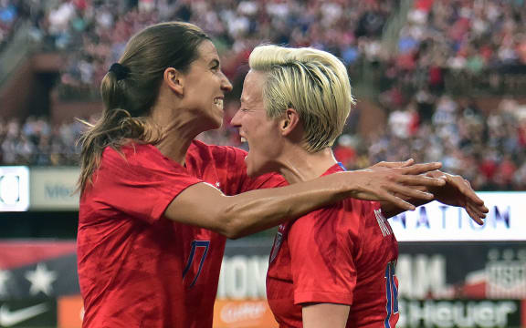 USA footballers Tobin Heath and  Megan Rapinoe.