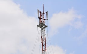 cell phone tower or mobile phone tower on blue sky background