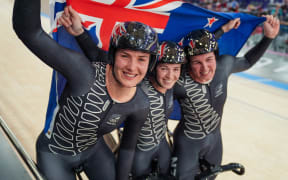 Picture by Zac Williams/SWpix.com - 04/08/2024 -  Paris 2024 Olympic Games - Track Cycling - National Velodrome, Saint-Quentin-en-Yvelines, France - Women’s Team Sprint Final For Gold - New Zealand: Rebecca Petch, Shaane Fulton, Ellesse Andrews celebrates winning the Olympic Silver Medal