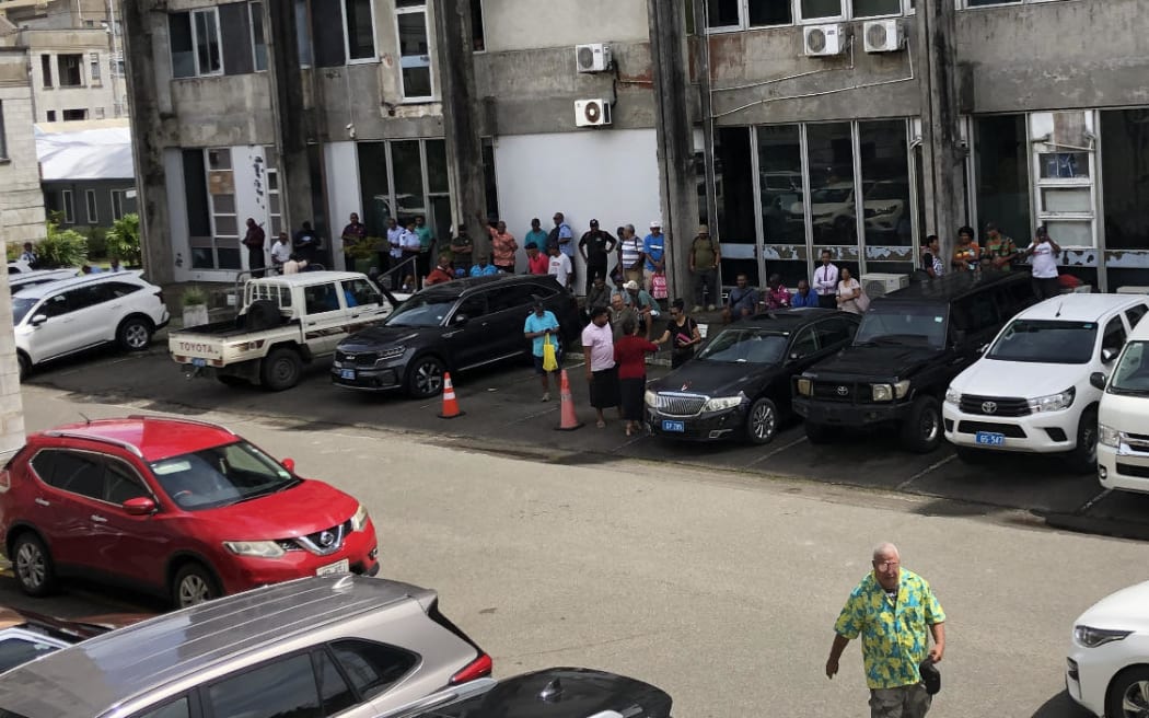 Supporters of Bainimarama and Qiliho outside the court house.