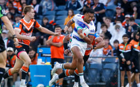 Adam Pompey in possession. Wests Tigers v One NZ Warriors. NRL Rugby League, Campbelltown Sports Stadium, NSW, Australia, Sunday 30th March 2025 Copyright Photo: David Neilson / www.photosport.nz