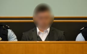 Grace Millane's killer at the sentencing for her murder.