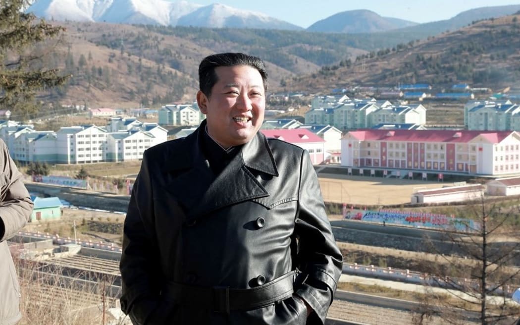 This undated picture released from North Korea's official Korean Central News Agency (KCNA) on November 16, 2021 shows North Korean leader Kim Jong Un (R) visiting Samjiyon city.