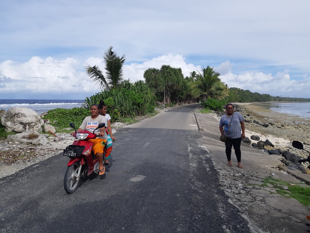A strip of land at the tip of Fogafale, where Tuvalu's capital us situated, separates ocean from lagoon and floods at king tide.