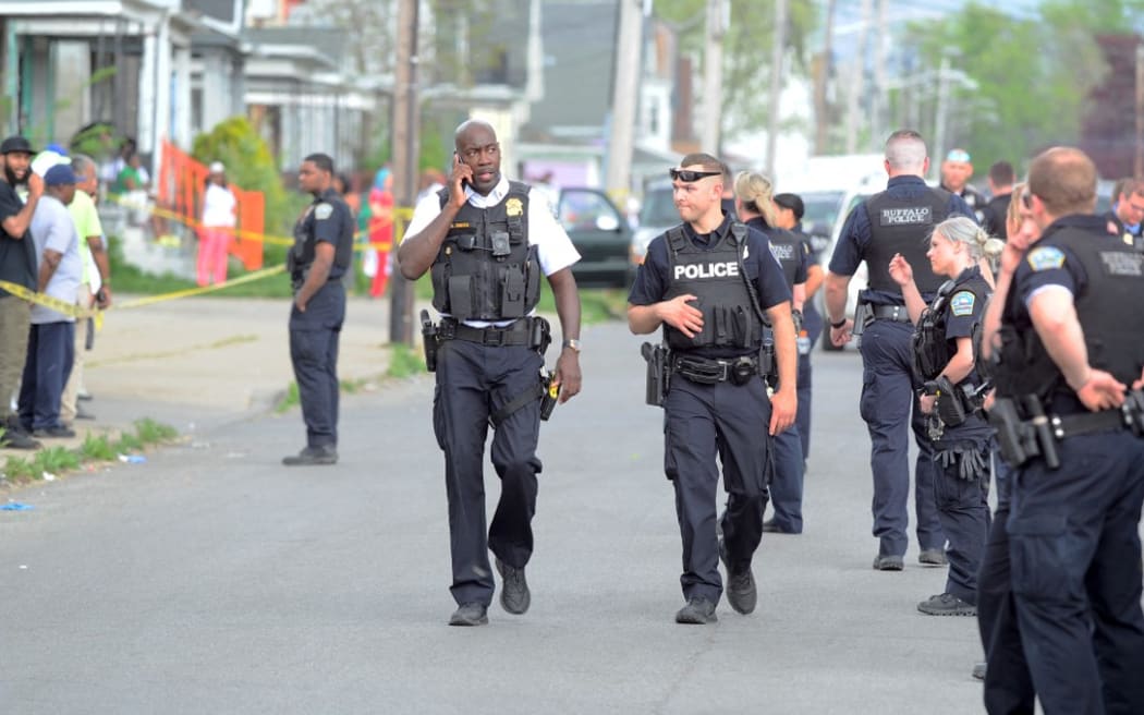 BUFFALO, NY - MAY 14: Buffalo Police on scene at a Tops Friendly Market on May 14, 2022 in Buffalo, New York. According to reports, at least 10 people were killed after a mass shooting at the store with the shooter in police custody.   John Normile/Getty Images/AFP (Photo by John Normile / GETTY IMAGES NORTH AMERICA / Getty Images via AFP)