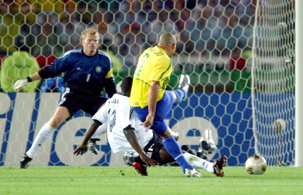 Brazilian forward Ronaldo kicks the ball and scores the 2-0 lead in the 2002 World Cup final.