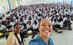 Gladys Bartlett and Mary Elizabeth Ramosaea with the KGVI students.