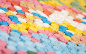 MDMA pills distributed by drug dealer seized by legal authority.