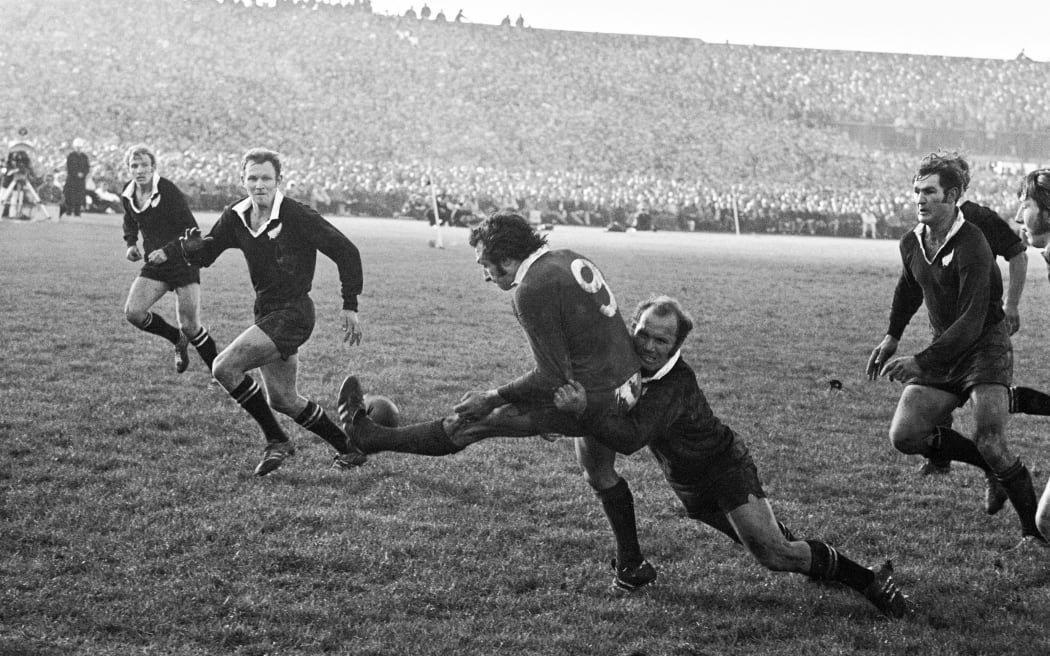 British Lions Tour 1971 Third Test Lancaster Park Lion's halfback Gareth Edwards tackled by All Black halfback Sid Going.