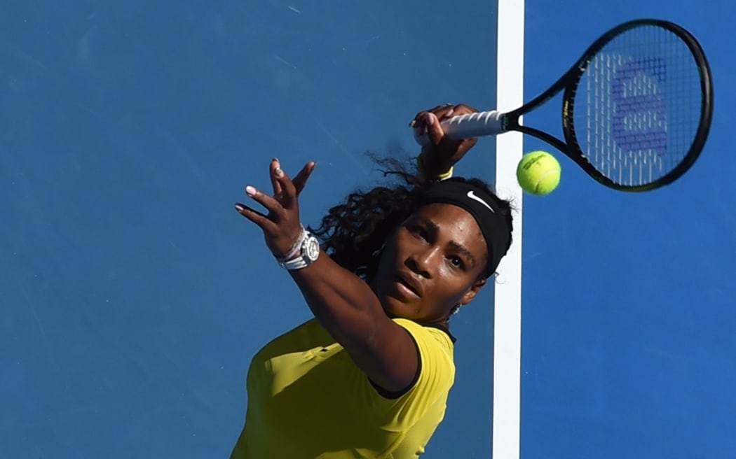 US great Serena Williams returns against Russia's Margarita Gasparyan on day seven of the 2015 Australian Open in Melbourne, Jan. 24, 2016. AFP PHOTO / PAUL CROCK