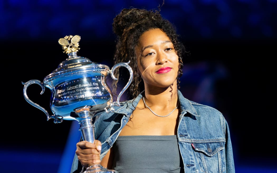 Naomi Osaka of Japan poses with the women's singles championship trophy during the draw announcement of the Australian Open tennis tournament in Melbourne on January 16, 2020. Won title in 2019