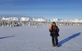 Alison Ballance recording at the Cape Crozier emperor penguin colony, Antarctica