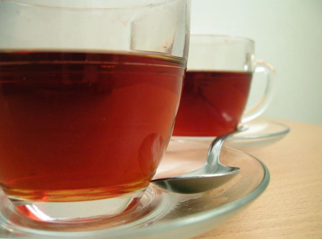 two cups of tea and teaspoon
