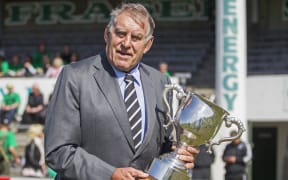 Sir Colin Meads holds the Meads Cup before the Meads Cup final rugby game between South Canterbury v Wanganui held at Alpine Energy Stadium, Timaru. 24 October 2015 Photo: Joseph Johnson / www.photosport.nz