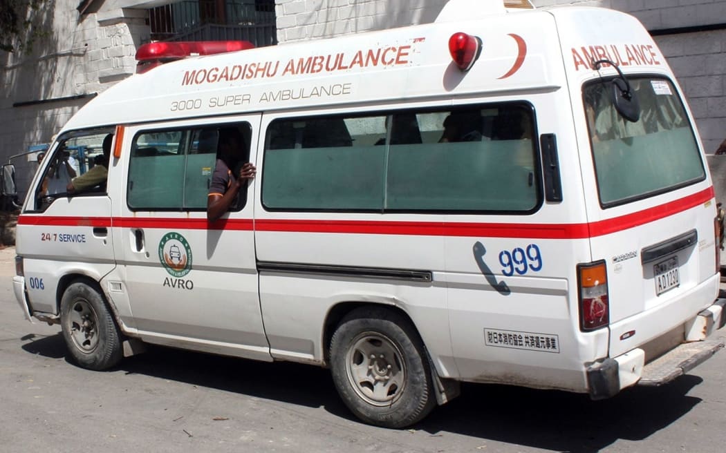 An ambulance arrives as a car bomb detonated in a crowded restaurant located near the city's Central Hotel in Somalia, killing at least five people in Somali capital Mogadishu, on April 21, 2015.