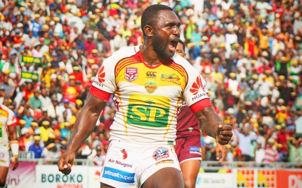 Ase Boas celebrates his try.