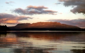 Sunset over Lake Tarawera. Photograph taken from Tarawera Landing Cafe, Rotorua
