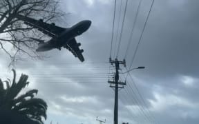 A US Air Force C-5M Super Galaxy landing at Auckland's Whenuapai air base on 7 September 2025.