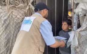 The first humanitarian food aid from New Zealand has been delivered to a camp in Gaza with about 2000 people, predominantly women and children.