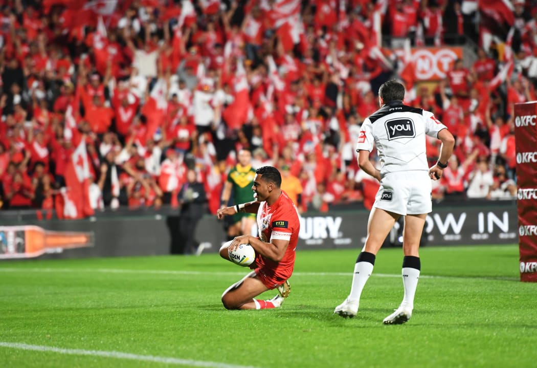 Tonga's Tevita Pangai Junior scores a try against Australia last year.