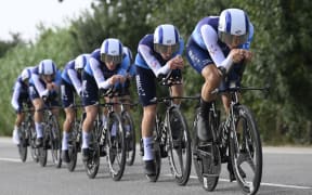 Team Israel Premier Tech 's riders compete during the fifth stage of La Vuelta a Espana cycling tour. The team includes New Zealander George Bennett.
