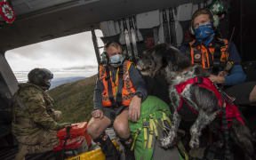Defence Force helicopter assists NZ Police and LandSAR with a search and rescue operation to find two missing trampers in the Kahurangi National Park.