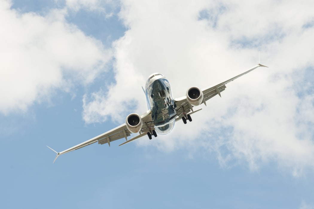 Boeing 737 MAX on a steep angled landing descent to Farnborough Airport, UK.