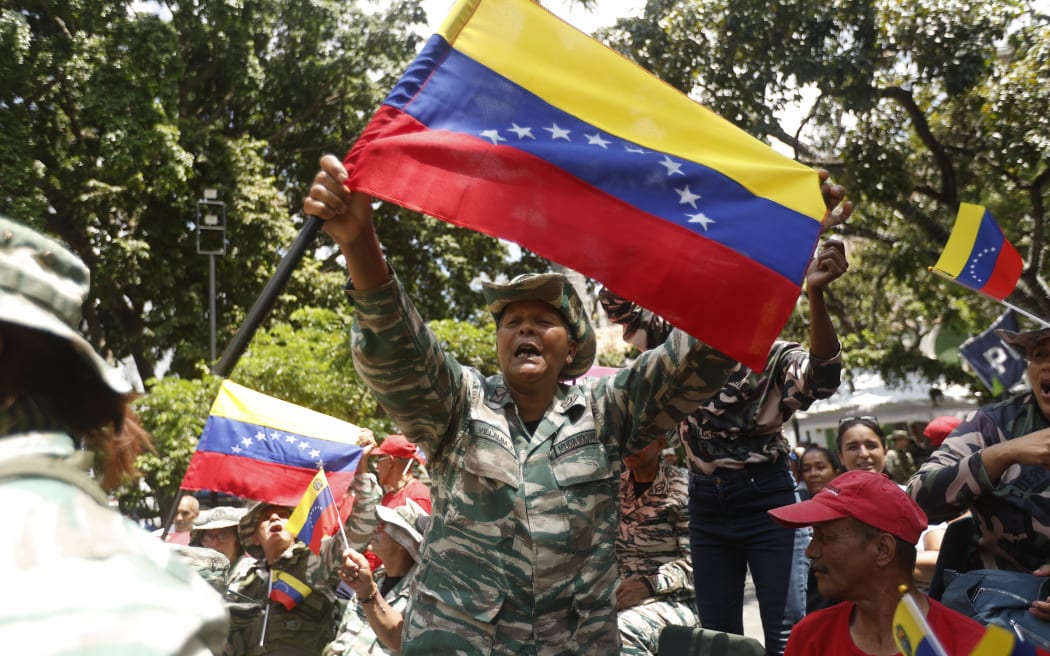 Members of Venezuela's Bolivarian National Militia taking part in military training at Plaza Bolivar in Caracas on 4 October, 2025.
